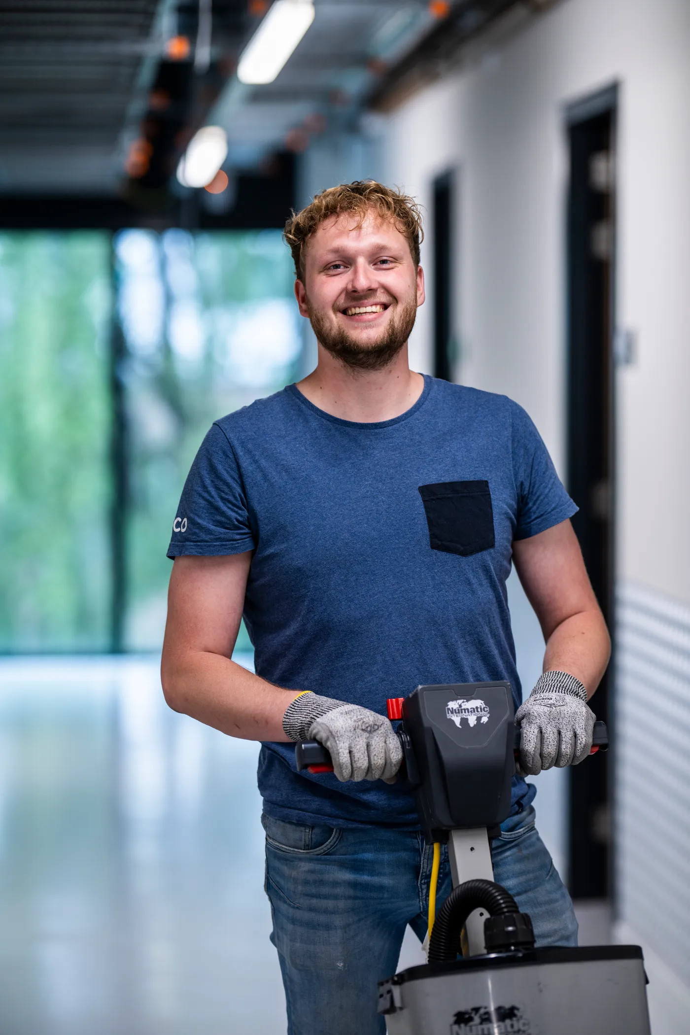 RIFCO technician with a cleaning machine in a data centre